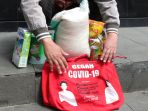 maki-serahkan-barang-bukti-bansos-covid-19-ke-kpk_20201216_214231.jpg
