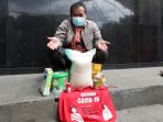 maki-serahkan-barang-bukti-bansos-covid-19-ke-kpk_20201216_214442.jpg