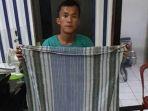 maling-sepeda-pakai-sarung.jpg
