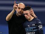 manajer-manchester-city-pep-guardiola-dengan-phil-foden.jpg