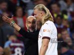 manajer-manchester-city-pep-guardiola-kiri-berbicara-haaland.jpg