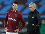 manajer-west-ham-united-skotlandia-david-moyes-dengan-kapten-declan-rice.jpg