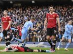 manchester-city-kalahkan-manchester-united-4-1_20220307_074514.jpg