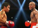 manny-pacquiao-dan-floyd-mayweather-jr_20150418_085233.jpg