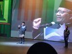 mantan-cawapres-ketua-dewan-penasihat-ika-uii-mahfud-md-saat-membacakan-puisi.jpg
