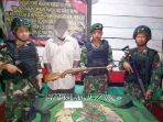 mantan-simpatisan-opm-serahkan-senjata-kepada-satgas-yonif-411-k_20200224_131712.jpg