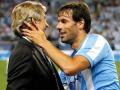 manuel-pellegrini-dan-ruud-van-nistelrooy.jpg