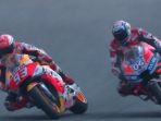 marc-marquez-dan-andrea-dovizioso_20181018_172458.jpg
