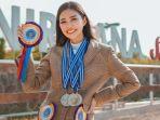 margenie-sabet-tiga-medali-di-nirwana-show-2021.jpg