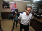 mario-ambarita-nekat-naik-ke-roda-pesawat-garuda-indonesia_20150408_152348.jpg