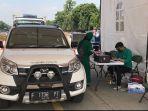 markas-besar-mabes-tni-gandeng-mahasiswa-menggelar-vaksinasi-drive-thru.jpg