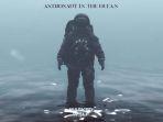 masked-wolf-astronaut-in-the-ocean.jpg