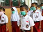 masker-pelindung-dipakai-siswa-sd-002-natuna-terkait-observasi-w_20200204_143956.jpg