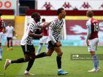 mason-greenwood-tengah-merayakan-gol-kedua-timnya-selama-pertandingan.jpg