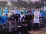massa-411-solat-sambil-ujan-ujanan.jpg