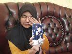 meli-rahmawati-33-menunjukkan-foto-saat-bersama-suaminya-nuryanto-37.jpg