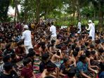 melihat-tradisi-mandi-lumpur-setelah-nyepi-di-bali_20220305_085908.jpg