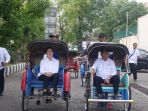 menhub-dan-menko-pmk-naik-becak-hadiri-dialog-nasional_20181110_171555.jpg