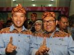 menpora-imam-nahrawi-berfoto-dengan-ketua-umum-pb-pon-xix-ahmad-heryawan_20160922_012411.jpg