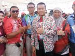 menpora-imam-nahrawi-dan-puspita-mustika-adya_20181012_072650.jpg