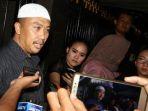 menpora-imam-nahrawi-menjawab-pertanyaan-wartawan-terkait-statusnya.jpg