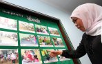 mensos-khofifah-indar-parawansa-tengok-tki_20141226_210244.jpg