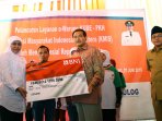 mensos-khofifah-resmikan-e-warung-kube-di-malang_20160628_133229.jpg