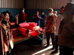 mensos-tri-rismaharini-tinjau-gudang-logistik-wilayah-timur_20210420_223545.jpg