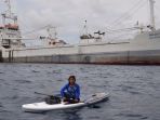 menteri-kelautan-perikanan-dan-susi-pudjiastuti-pose-di-depan-kapal-tangkapan_20171204_204815.jpg