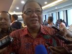 menteri-koperasi-dan-ukm-anak-agung-gede-ngurah-puspayoga_20180106_105818.jpg