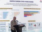 menteri-koperasi-dan-ukm-teten-masduki-podium.jpg