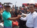 menteri-pertanian-panen-raya-padi-di-sulawesi-tenggara_20151026_090439.jpg
