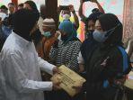 menteri-sosial-tri-rismaharini-santunan-nih3.jpg