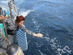 menteri-susi-tebar-bibit-lobster-di-nusa-penida.jpg