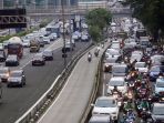 menurunnya-penderita-covid-19-jakarta-kembali-macet_20220318_193449.jpg