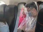 menutupi-seluruh-tubuhnya-menggunakan-plastik-untuk-menghindari-virus-corona.jpg