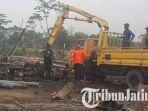 mesin-penyedot-yang-disita-polisi-dari-penambang-pasir-ilegal-di-sungai-brantas-tulungagung_20180920_205814.jpg
