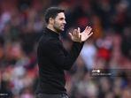 mikel-arteta-bertepuk-tangan.jpg