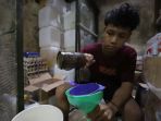 minyak-goreng-di-pasar-belum-satu-harga_20220126_202848.jpg