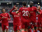 mo-salah-dan-sadio-mane-ikut-merayakan-gol-diogo-jota.jpg