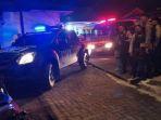 mobil-membawa-jenazah-staf-satpol-pp-sulut.jpg