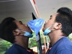 mobil-pcr-bantuan-bnpb-tes-swab-massal-warga-surabaya_20200601_170846.jpg