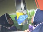 mobil-pcr-bantuan-bnpb-tes-swab-massal-warga-surabaya_20200601_172107.jpg