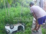 mobil-tabrak-pembatas-jalan.jpg