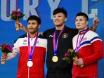 momen-rahmat-erwin-raih-emas-asian-games-2022-dan-rekor-dunia_20231004_074445.jpg