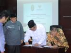 mou-dana-iwadh-baznas_20180411_094704.jpg