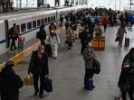 mudik-imlek-jutaan-warga-china_20230121_080129.jpg