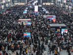 mudik-imlek-jutaan-warga-china_20230121_080340.jpg