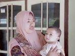 muhammad-karunia-bayi-kembar-siam-enam-kaki.jpg