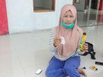 muntah-beling-nur-aisah-warga-kelurahan-kampung-syahmad.jpg